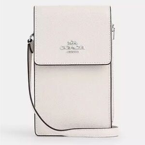 NWT Coach North South Phone Crossbody Ivory
Comparable Value
$228